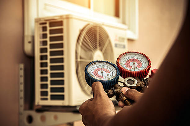 Professional Ductwork Repair technician working in Greenville, MI
